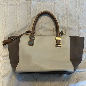 Vince Camuto cream and tan satchel purse
